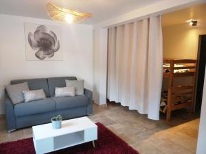 Posezení v ubytování Joli studio calme et moderne