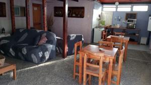 Posezení v ubytování Hostal El Colibri