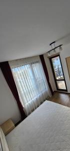 Postel nebo postele na pokoji v ubytování Sea View apartment, Morsky Bryag