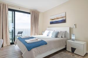 Giường trong phòng chung tại Blue Ocean Villa +56 ảnh