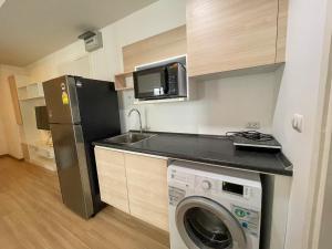 Kuchyň nebo kuchyňský kout v ubytování 2BR Apartment
