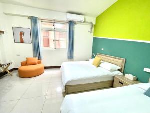 Postel nebo postele na pokoji v ubytování Banshan Yunxiu Homestay