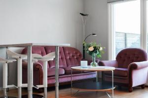 Area soggiorno di Charming Sea-view Haven by AJF Dream Living