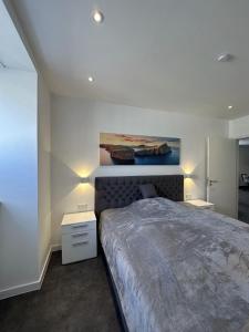 Postel nebo postele na pokoji v ubytování 4-Living Apartment Houses