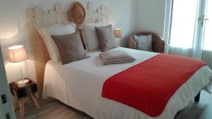 מיטה או מיטות בחדר ב-Chez Carca, au pied de la Cite de Carcassonne