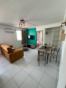 a living room with a couch and a table at Republique Lounge in Fort-de-France