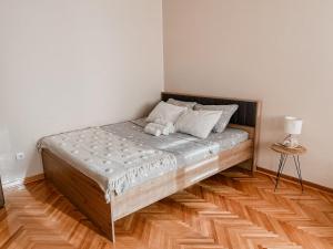 Postel nebo postele na pokoji v ubytování Manila Apartment Kragujevac