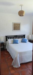 Łóżko lub łóżka w pokoju w obiekcie Butia Aguas Dulces