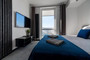 Φωτογραφία από το άλμπουμ του Nowe Apartamenty Warszawa Wiktoryn TV Smart WI-FI στη Βαρσοβία +4 φωτογραφίες