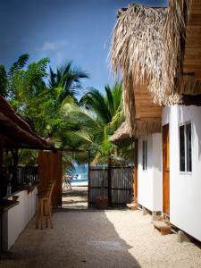 a resort with a view of the ocean and palm trees at Mithival Beach Rincón del Mar in Rincón
