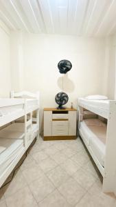 Ένα ή περισσότερα κρεβάτια σε δωμάτιο στο Hostel Canto Zen