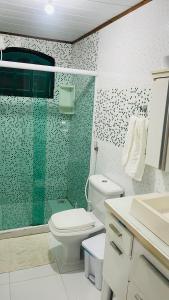 Ένα μπάνιο στο Suite Proximo a Praia