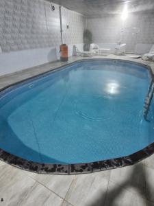 Bazén v ubytování Grandvadi Villa kapalı ısıtmalı havuz nebo v jeho okolí
