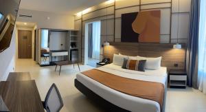 Postel nebo postele na pokoji v ubytování Grand Hotel&Casino Vía Dorada + 37 fotografií