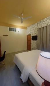 Ένα ή περισσότερα κρεβάτια σε δωμάτιο στο Sandy Heaven Maldives