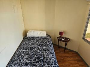 Postel nebo postele na pokoji v ubytování Cristian Andrades
