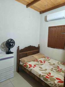 Postel nebo postele na pokoji v ubytování Casa rustica de Praia em Cumuruxatiba-BA