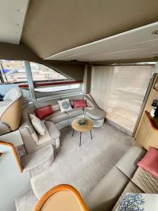 an overhead view of a living room in a boat at Yate Rumbo, casa flotante in Adeje