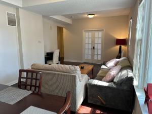 a living room with a couch and a table at Lyndale Oasis in Minneapolis