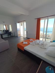 Postel nebo postele na pokoji v ubytování Hotel Cosmos
