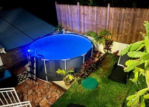 Φωτογραφία από το άλμπουμ του Villa Iguana, duplex paisible, vue magnifique mer et rocher du Diamant, piscine σε Sainte-Luce +14 φωτογραφίες