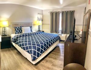 Postel nebo postele na pokoji v ubytování Best Motel