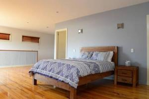 Krevet ili kreveti u jedinici u objektu Beachwood Retreat for Ultimate Relaxation