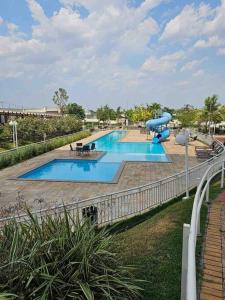 Kolam renang di atau dekat dengan Apartamento de Luxo com Suíte, Academia, Piscina e Mercado