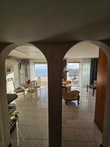 a living room with a view of the ocean at TABAIBA REFUGIO DEL MAR in Santa Cruz de Tenerife