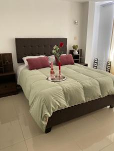 Ένα ή περισσότερα κρεβάτια σε δωμάτιο στο HOTEL CB CAJAMARCA HUACARIZ