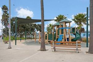 a park with a playground with a slide at AWESOME 3BR 1 Block To Ocean Fast WIFI C1 in Newport Beach
