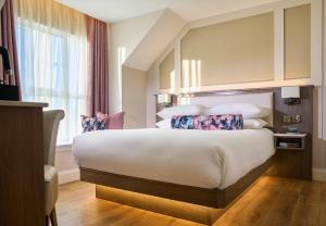 Voodi või voodid majutusasutuse The James Hotel toas