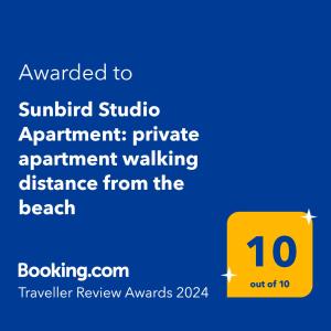 a yellow sign that saysauthorized studio appointment private apartment walking distance from the beach at Sunbird Studio Apartment: private apartment walking distance from the beach in Trinity Beach
