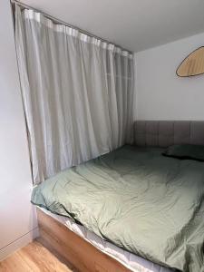 Postelja oz. postelje v sobi nastanitve Shanghai Hills & CoZy BnB