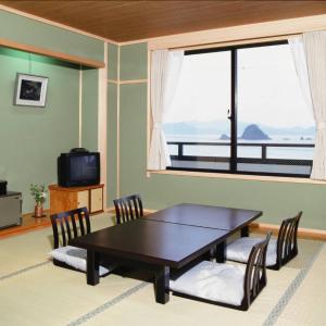 TV a/nebo společenská místnost v ubytování Sea View Inn MURAMIYA