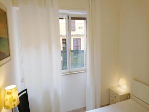 A bed or beds in a room at Grottammare mon amour Kira