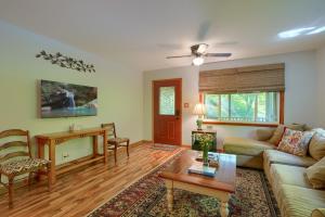a living room with a couch and a table at Hillside Hideaway in Logan
