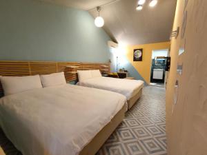 Postel nebo postele na pokoji v ubytování Lucky Star Inn