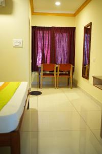 Fotografie z fotogalerie ubytování Coorg Inn v destinaci Kushalnagar + 15 fotografií