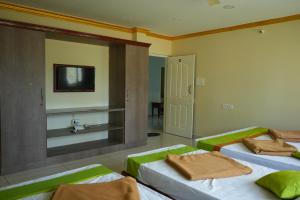 Fotografie z fotogalerie ubytování Coorg Inn v destinaci Kushalnagar