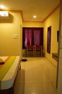 Fotografie z fotogalerie ubytování Coorg Inn v destinaci Kushalnagar