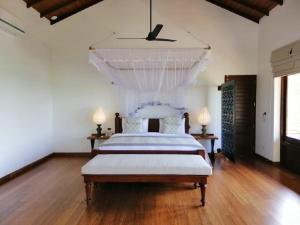 Calamansi Cove Villas 객실 침대