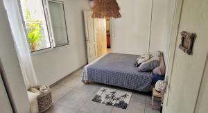 Postel nebo postele na pokoji v ubytování Ô coin des baleines