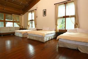 Postel nebo postele na pokoji v ubytování Summer Trail B&B