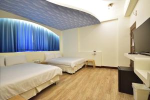 Letto o letti in una camera di 台東1314電梯民宿