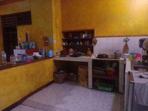 A cozinha ou kitchenette de Casa Minha Backpackers Hostel
