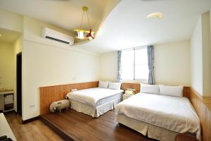 Letto o letti in una camera di 台東1314電梯民宿