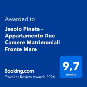 Ett certifikat, pris eller annat dokument som visas upp på Jesolo Pineta - Appartamento Due Camere Matrimoniali Fronte Mare