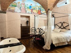 Posteľ alebo postele v izbe v ubytovaní Luxury Corte dei Nobili