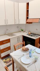 Kuchyň nebo kuchyňský kout v ubytování Casa vacanza Lumar